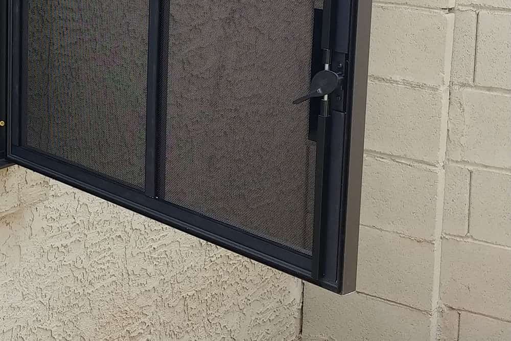Window security screen with release latch
